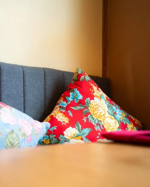 Floral cushions on a banquette seat